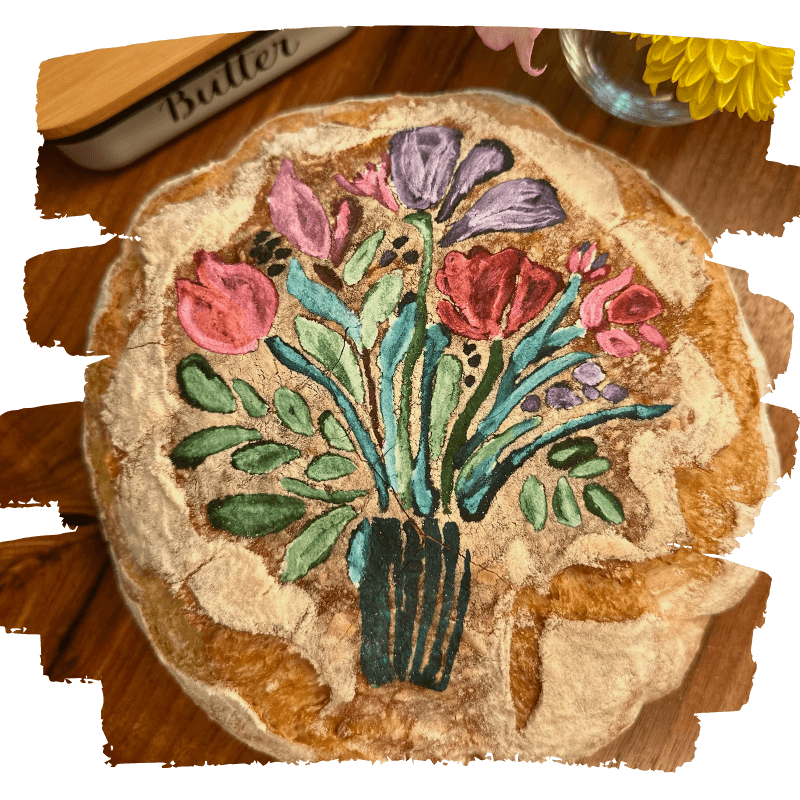 imagine Hand-painted bread shaped like a flower bouquet, on wooden table