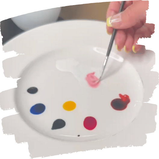 Module 4 - palette Edible paint palette with food coloring and brushes beside it.